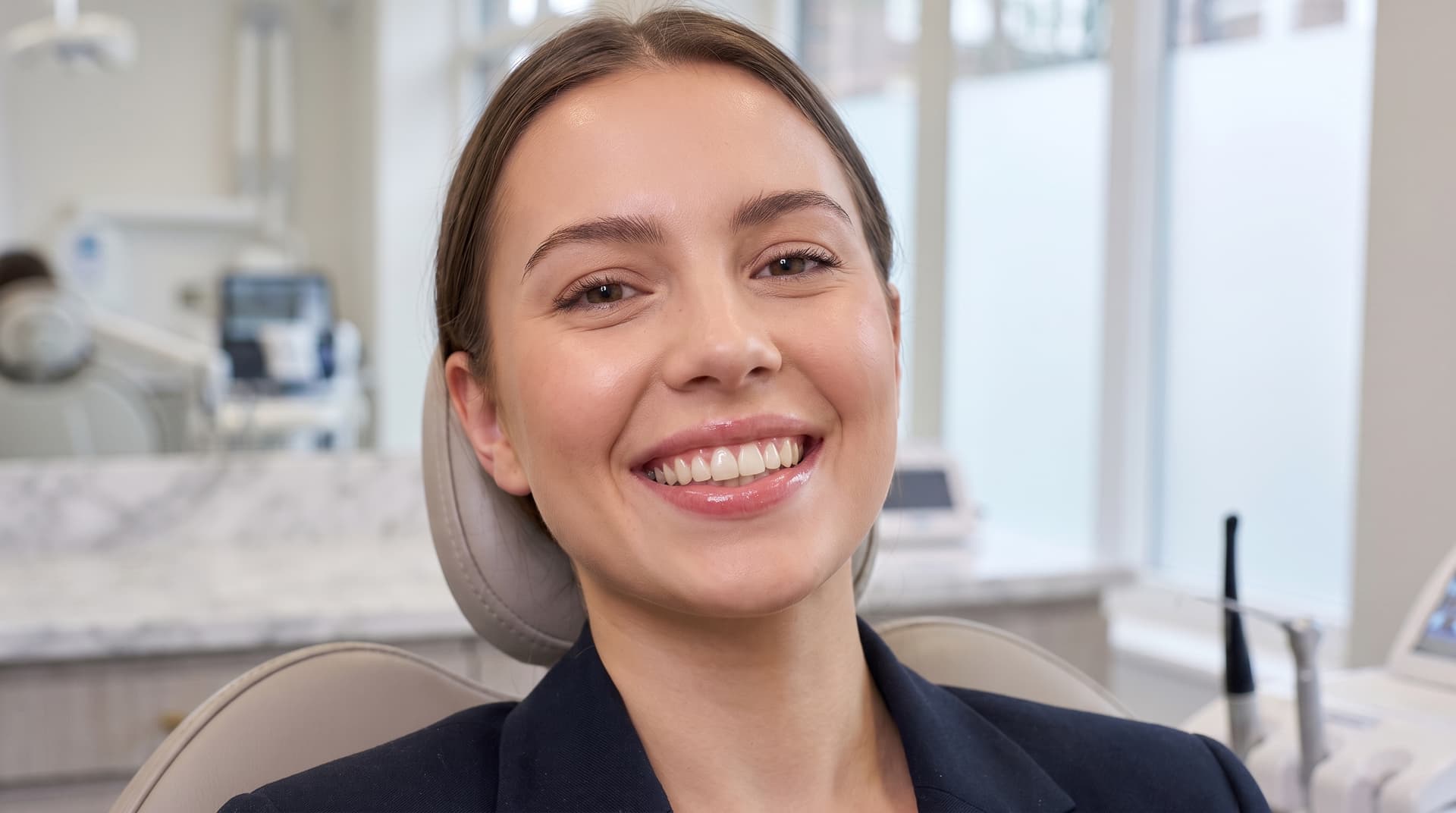 Relaxed patient smiling after dental implant treatment at a Vaughan dental clinic